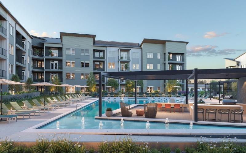 a swimming pool with lounge chairs