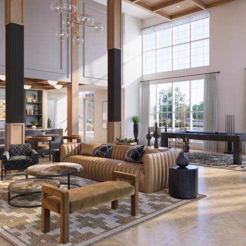 Beautiful clubroom with lounge seating and a billiards area
