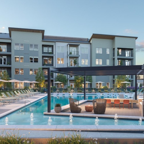 a pool in front of a building
